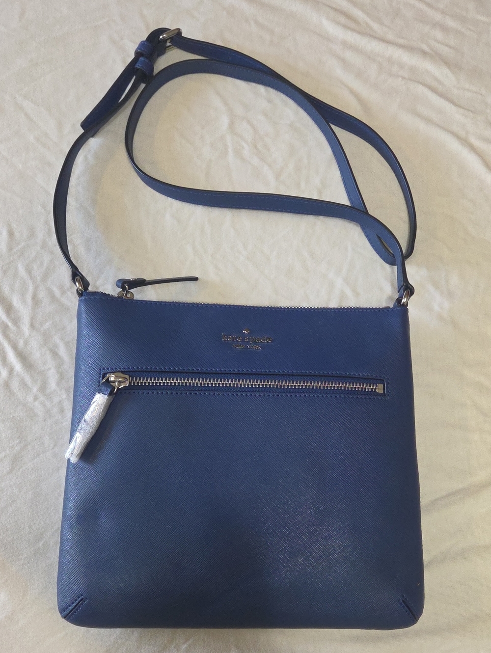 Kate Spade French Navy blue crossbody bag with front zip pocket